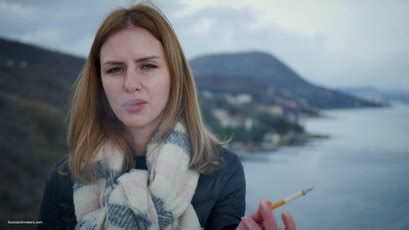 Russian Babe With Scarf Smoking A Cigarette By The River 11 Photos