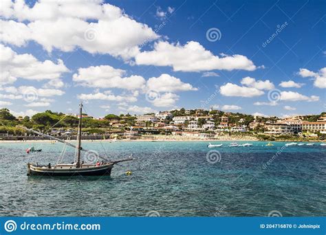 Picturesque View Looking Across To Cala Batistoni Beach and Baia Sardinia in Summer with Moored ...