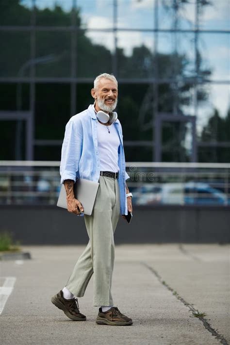 A Mature Gay Man With A Stock Photo Image Of Sneakers