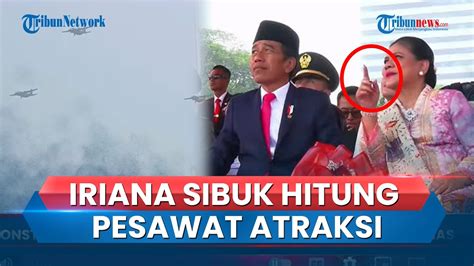 Iriana Jokowi Sibuk Hitung Jumlah Pesawat Yang Lakukan Atraksi Di HUT