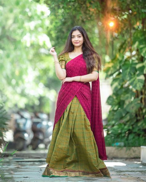 Athmika Sumithran In Mehendi Green And Pink Dhavani Half Saree