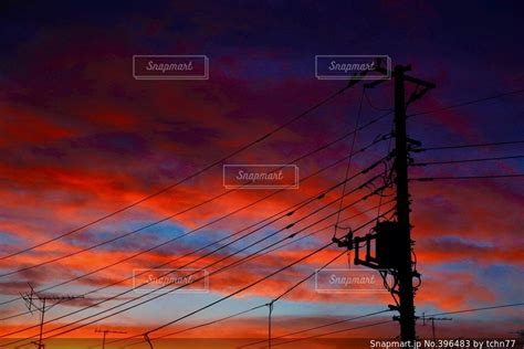 夕焼けと電線の写真・画像素材 396483 Snapmart（スナップマート）