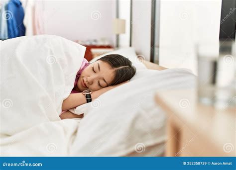 Young Chinese Girl Sleeping On The Bed At Bedroom Stock Image Image