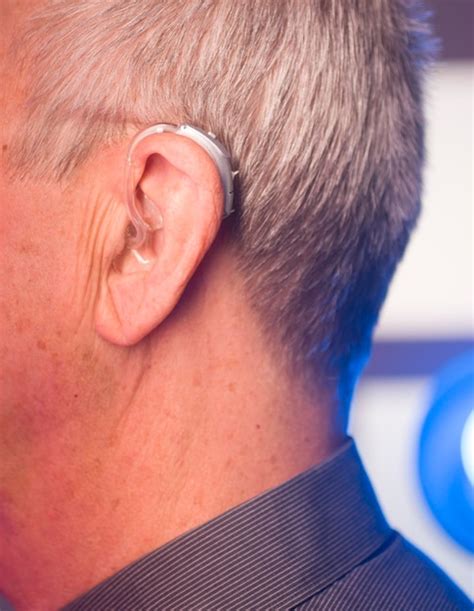 Premium Photo Close Up Of Man Wearing Hearing Aid