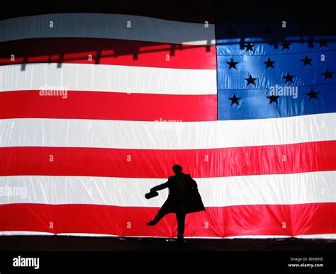 Silhouette of man behind American flag Stock Photo - Alamy