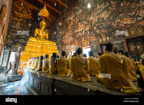 The Golden Buddha Statue In Wat Suthat Temple In Bangkok Thailand