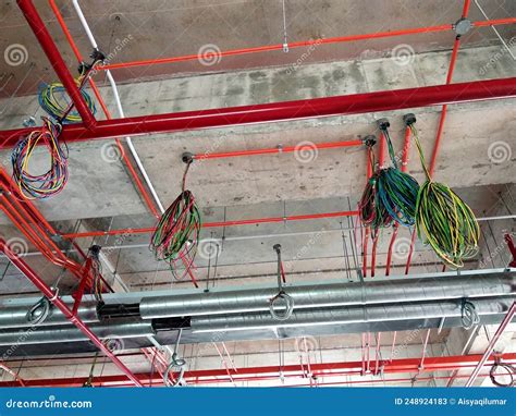 Electrical Conduit And Cable Tray Are Installed Hanging On The Floor