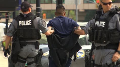 A Man Is Taken Into Police Custody Following The Incident On Portage