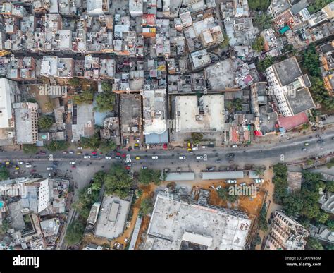 Aerial view of bustling urban landscape with dense buildings and busy ...