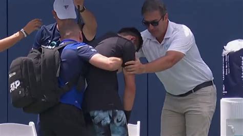 Tennis star Yibing Wu COLLAPSES in shocking scenes as he's forced to ...