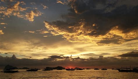 Silhouette of Ships during Sunset · Free Stock Photo