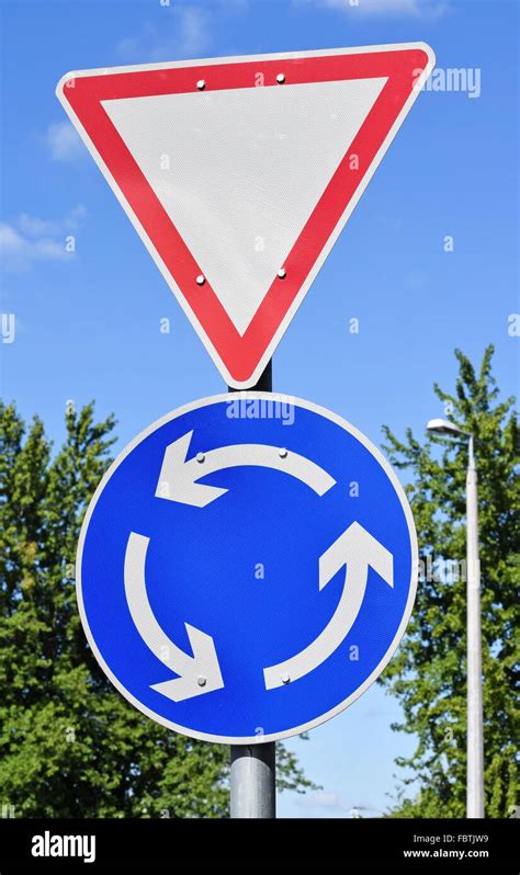 Yield And Roundabout Traffic Signs Stock Photo Alamy