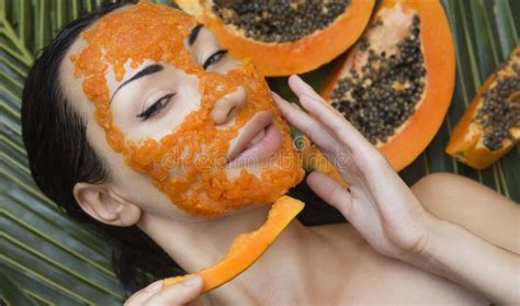 Beautiful Woman Having Fresh Papaya Facial Mask Apply Fresh Pap Stock