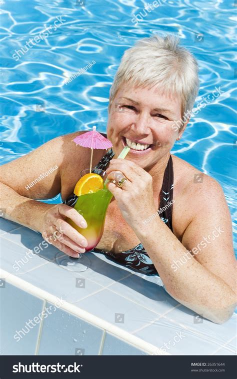 Relaxed Mature Woman Enjoying Summer Holidays Stock Photo 26351644