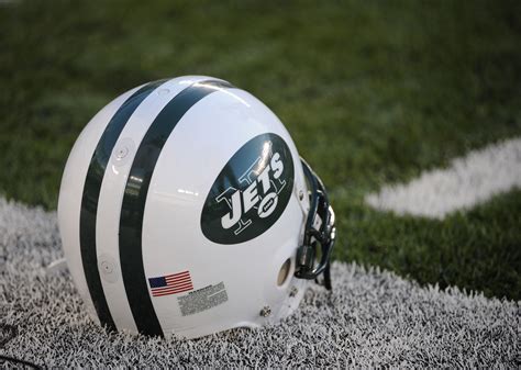 New York Jets helmet on the football field. | Nfl photos, Nfl football ...