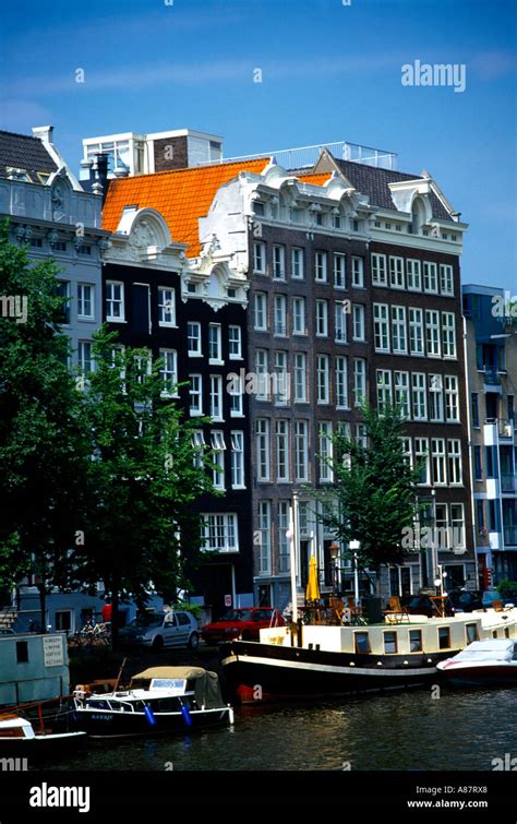 Amsterdam Holland Canal & Houses Stock Photo - Alamy