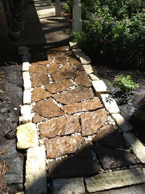 We Put In A Slate And Rock Pathway Going From The Driveway To The Front