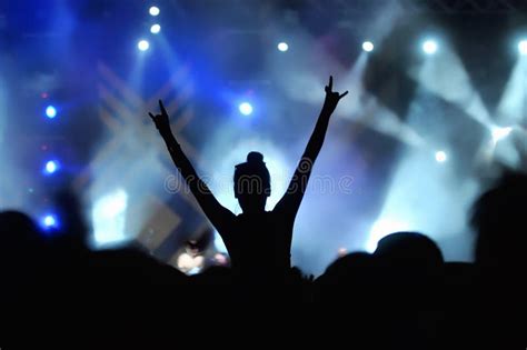 Girl enjoying the concert stock image. Image of blue - 36729871