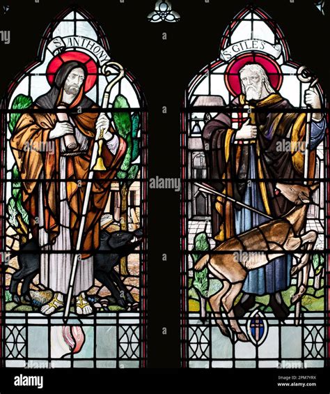 Saints Anthony and Giles (venerated religious hermits) depicted by Edward Woore (1937) in St ...