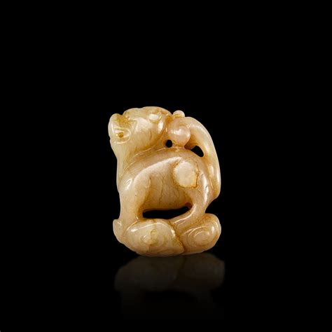 A white and russet jade mythical beast Ming dynasty 明 白玉瑞獸 The