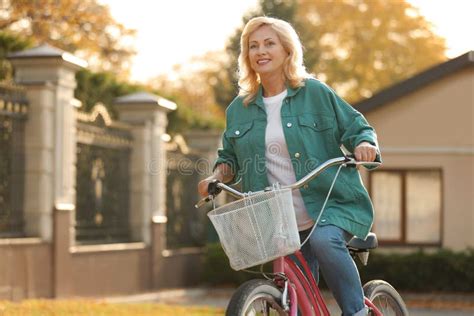 Mature Woman Riding Bicycle Active Lifestyle Stock Image Image Of