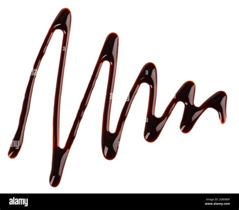 Chocolate Syrup Drizzle Isolated On White Background Splashes Of Sweet