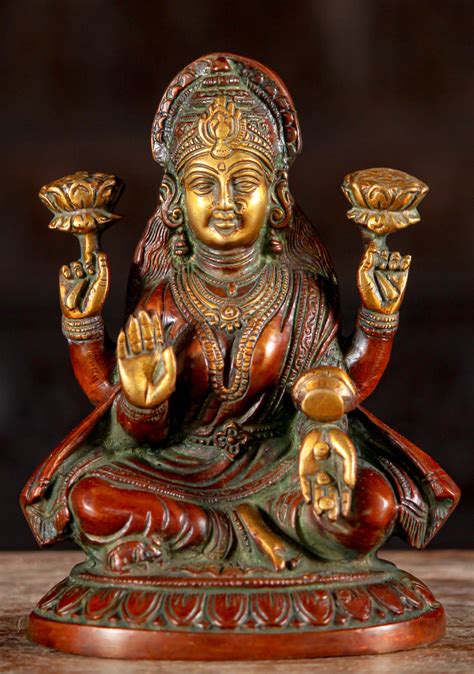 Brass Lakshmi Holding Two Lotus Flowers With Overflowing Money Pot