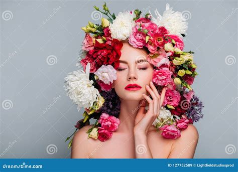 Portrait Of Beautiful Naked Woman With Closed Eyes Posing In Floral