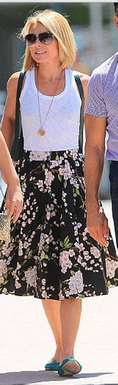 Who Made Kelly Ripas Green Leather Handbag And Black Floral Skirt