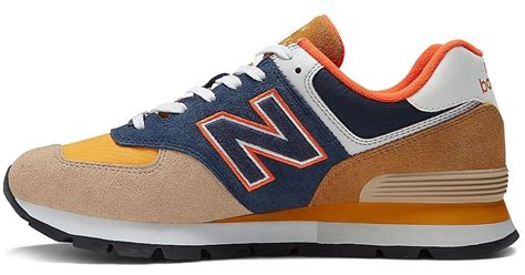 New Balance 574 Rugged Logo Suede Running Sneakers In Blue For Men Lyst