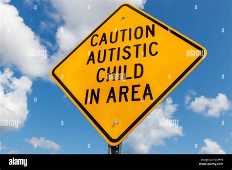 Yellow Caution Autistic Child In Area Traffic Sign I Stock Photo Alamy