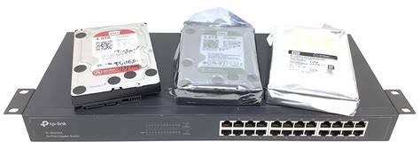 Lot - TP-Link 24 Port Gigabit Switch, Hard Drives