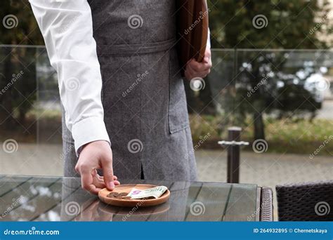 Waiter Taking Tips from Wooden Table in Outdoor Cafe, Closeup Stock ...