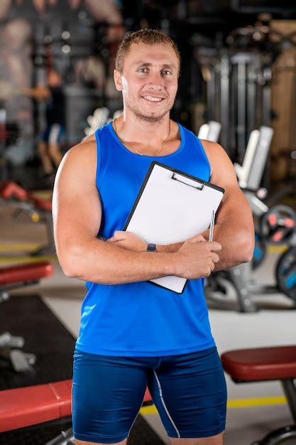 Premium Photo Portrait Of A Man A Personal Trainer Holding A