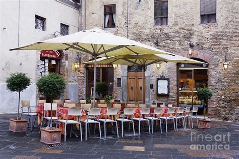 Seating at Outdoor Cafe Photograph by Jeremy Woodhouse - Fine Art America