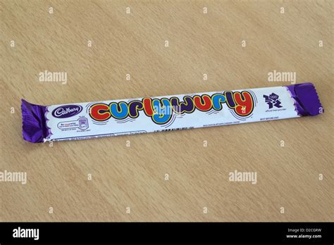 Cadburys Curlywurly Chocolate Bar Stock Photo Alamy