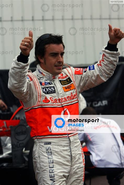 Pole Sitter Fernando Alonso Esp Mclaren Celebrates In Parc Ferme