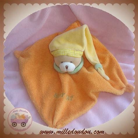 BABYNAT BABY NAT DOUDOU PELUCHE OURS PLAT ORANGE BONNET JAUNE