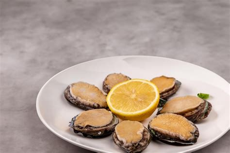 Premium Photo Exquisite Seafood Served On An Abalone Plate