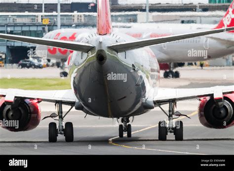 Rear view of a Jet 2.com Boeing 737 aeroplane taxying to the terminal ...