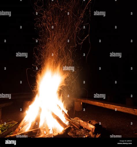 Campfire With Flying Sparks In The Night Stock Photo Alamy