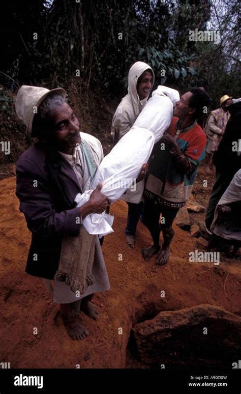 Corpses taken out of their graves by relatives in famadihana rituals in ...