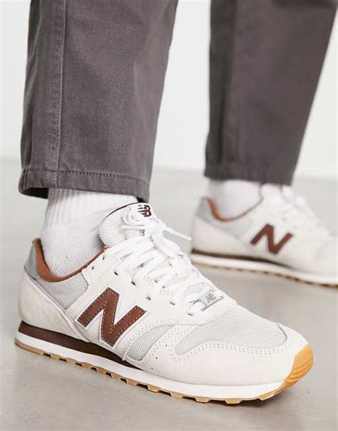 New Balance 373 Trainers In Off White And Brown Asos