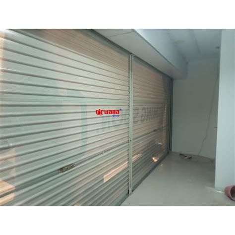 Pemasangan Rolling Door One Sheet Full Perforated Di Alfamart