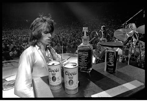 Heres 8 Photos Of Keith Richards Drinking Jack Daniels The Strut