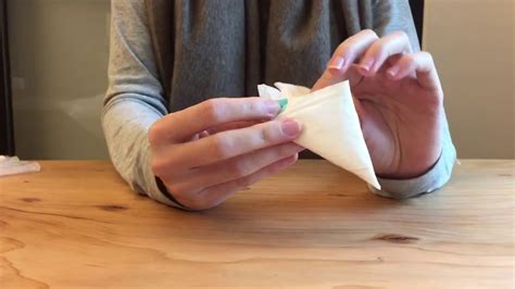 How To Fold A Plastic Bag Into A Triangle To Save Space YouTube