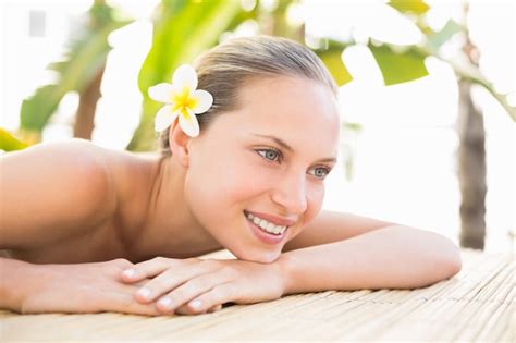 Premium Photo Peaceful Blonde Lying On Massage Table