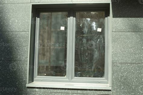 Window in building. Black window frame. New house. 26680057 Stock Photo