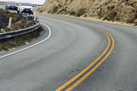 Tesla plunges off cliff at Devil’s Slide, 2 adults, 2 children rescued