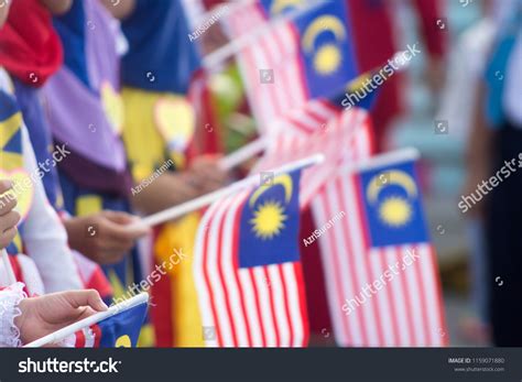 Hand Waving Malaysia Flag Known Jalur Stock Photo 1159071880 Shutterstock